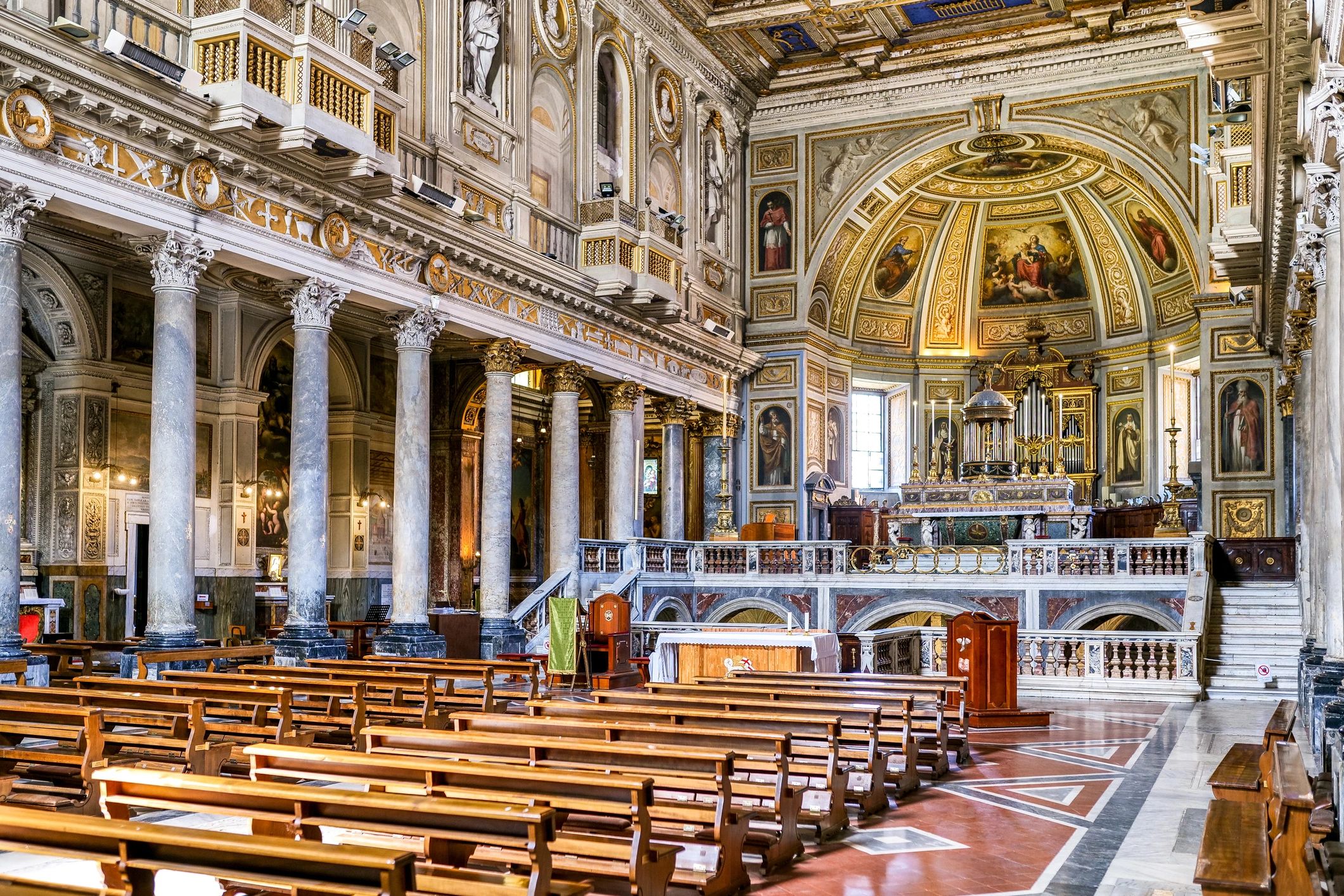 Historic church interior with columns and central aisle