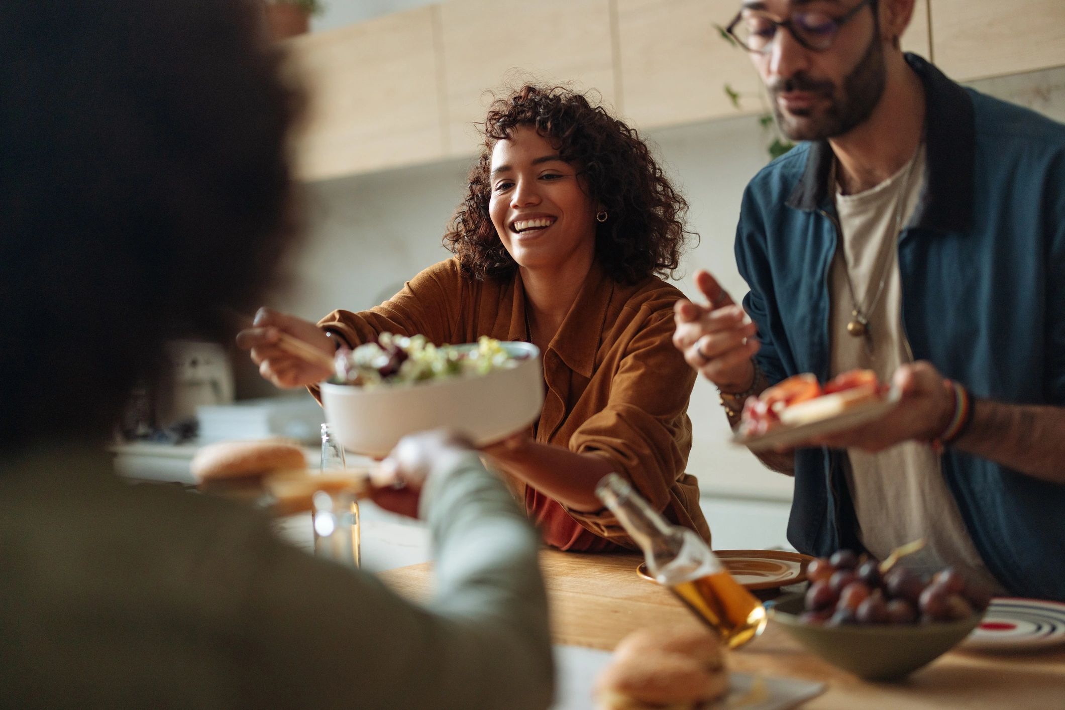 Friends sharing food at a table