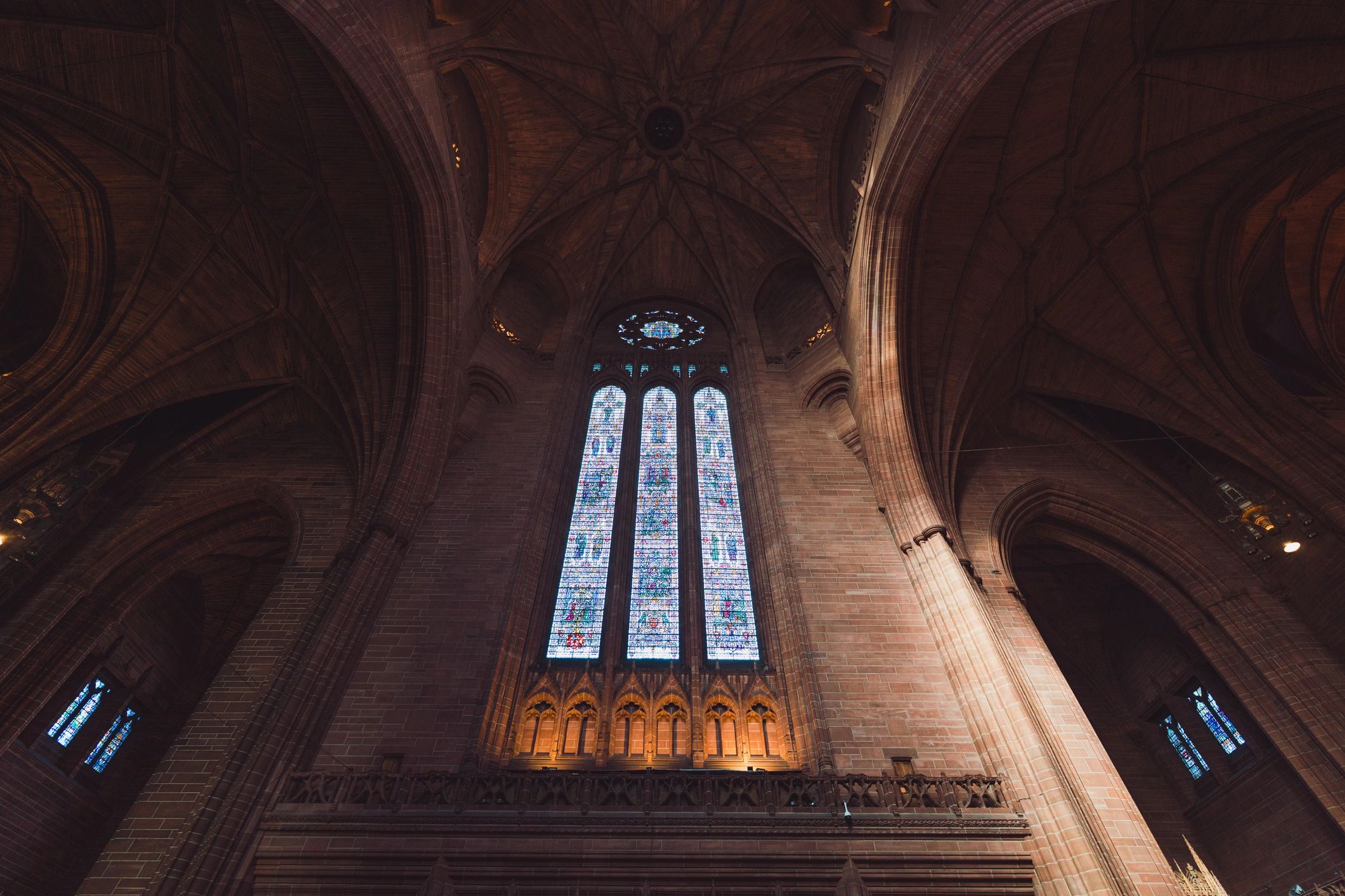 Cathedral interior with stained glass window