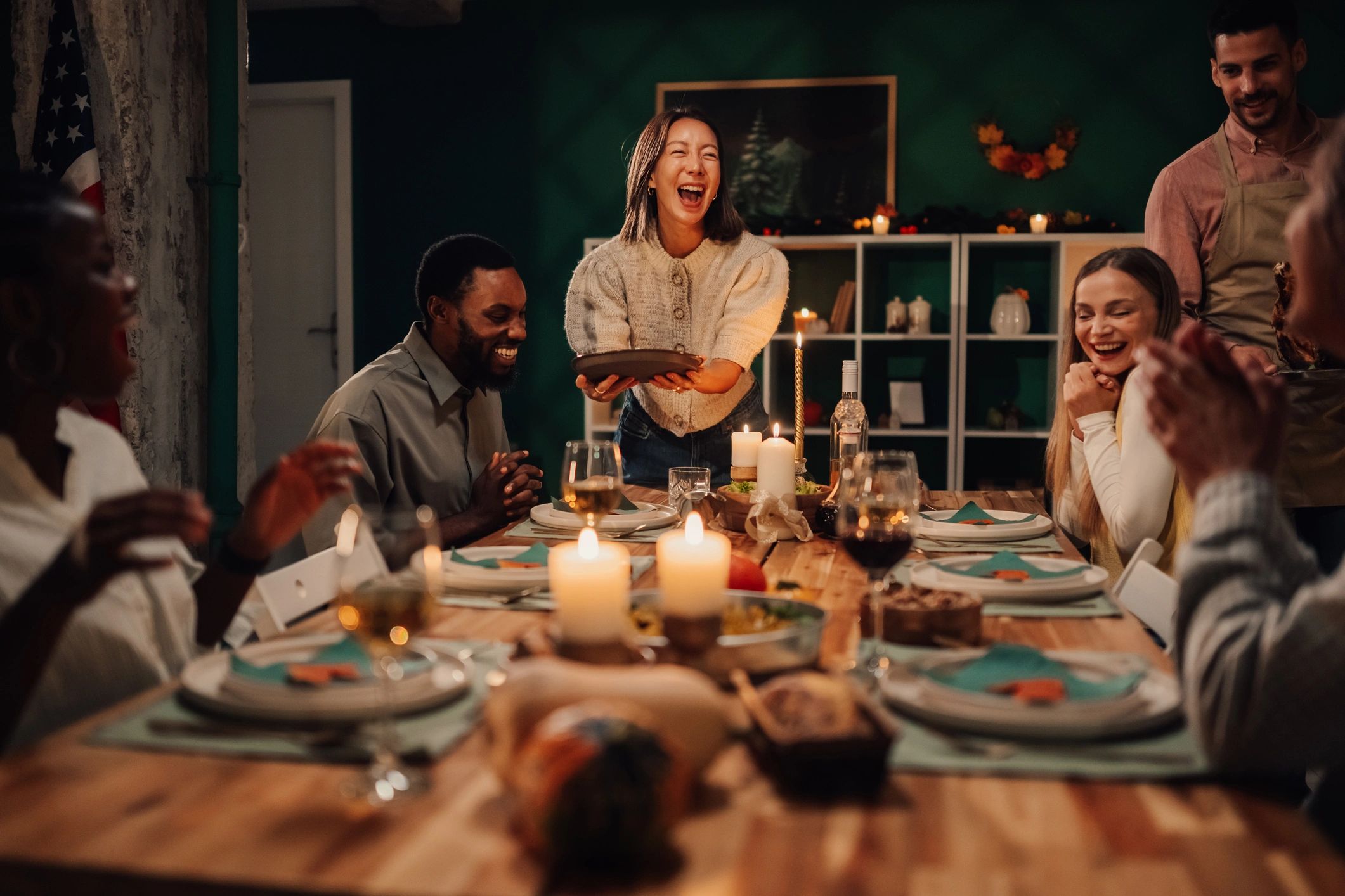 Friends gathered around a dinner table
