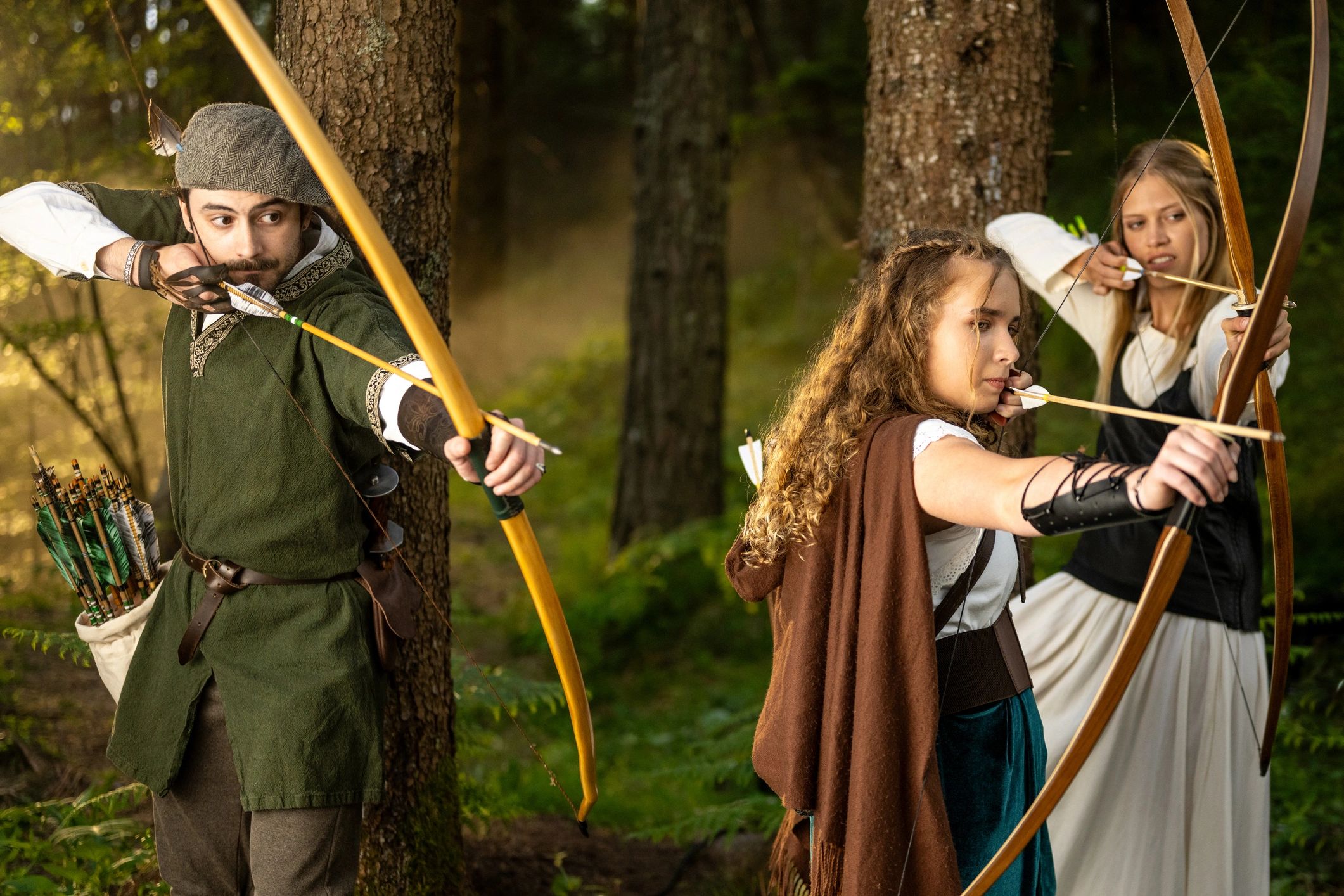Medieval archers practicing in a forest