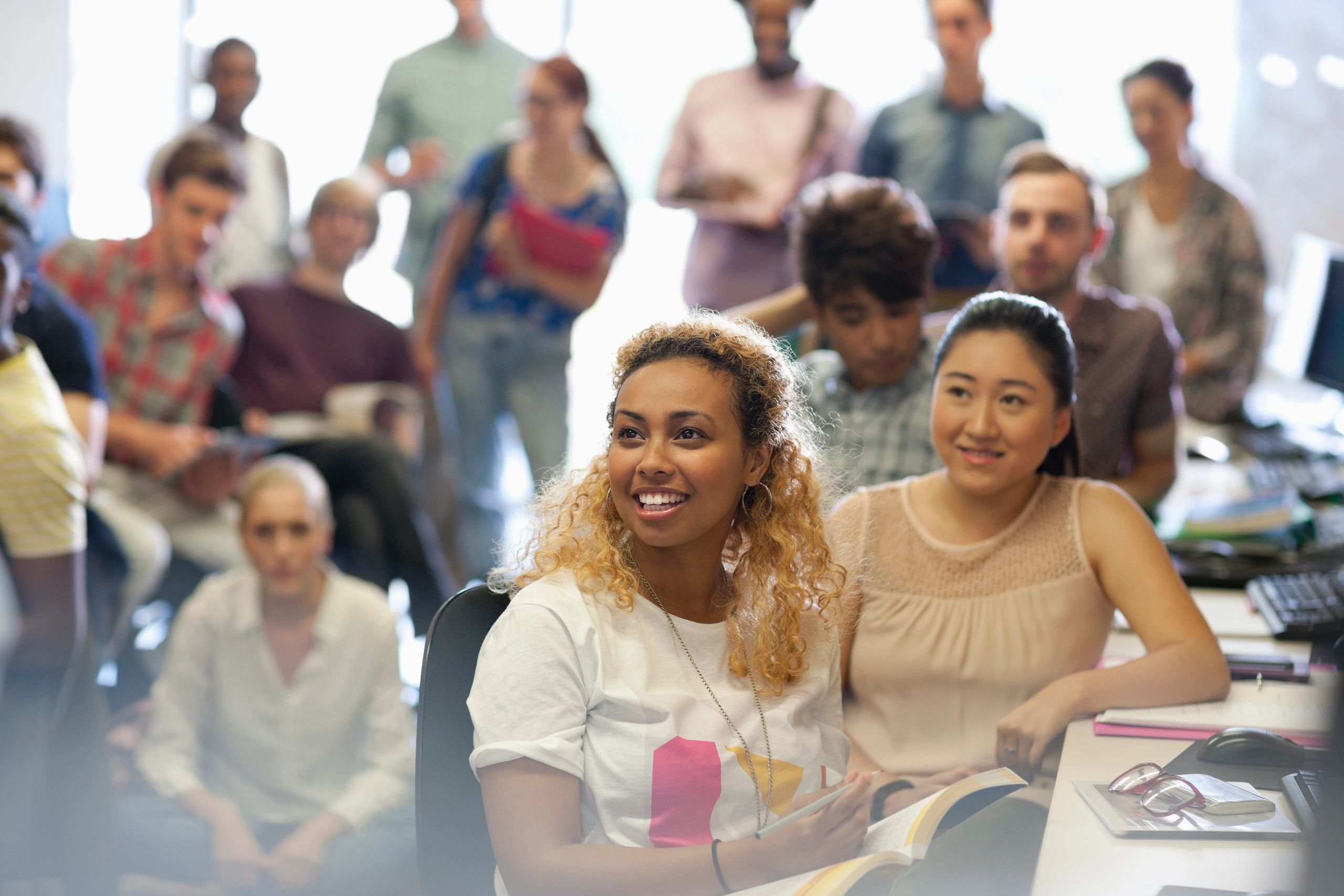 People attending a seminar indoors